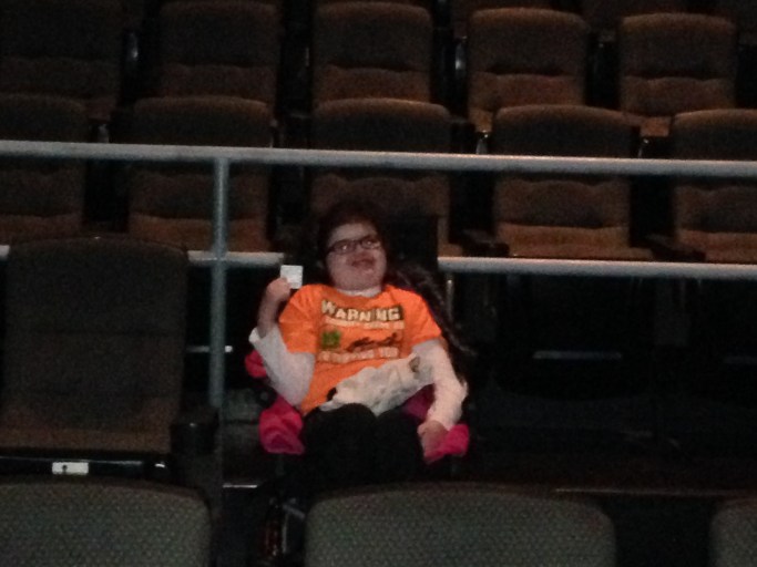 My daughter waiting patiently for "Goosebumps" to start! Which was awesome horror fans!